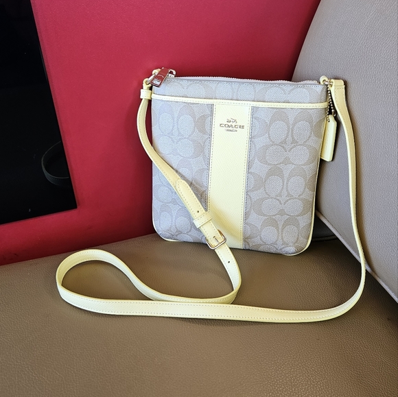 Coach Handbags - EUC coach signature crossbody